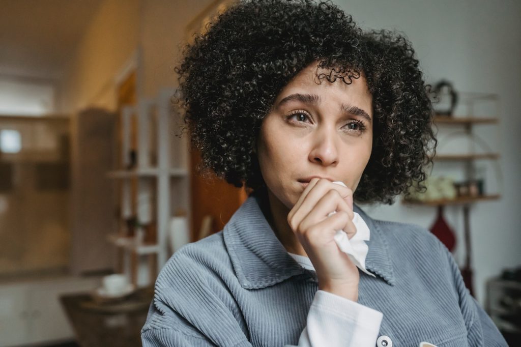 Woman with low self-confidence crying.